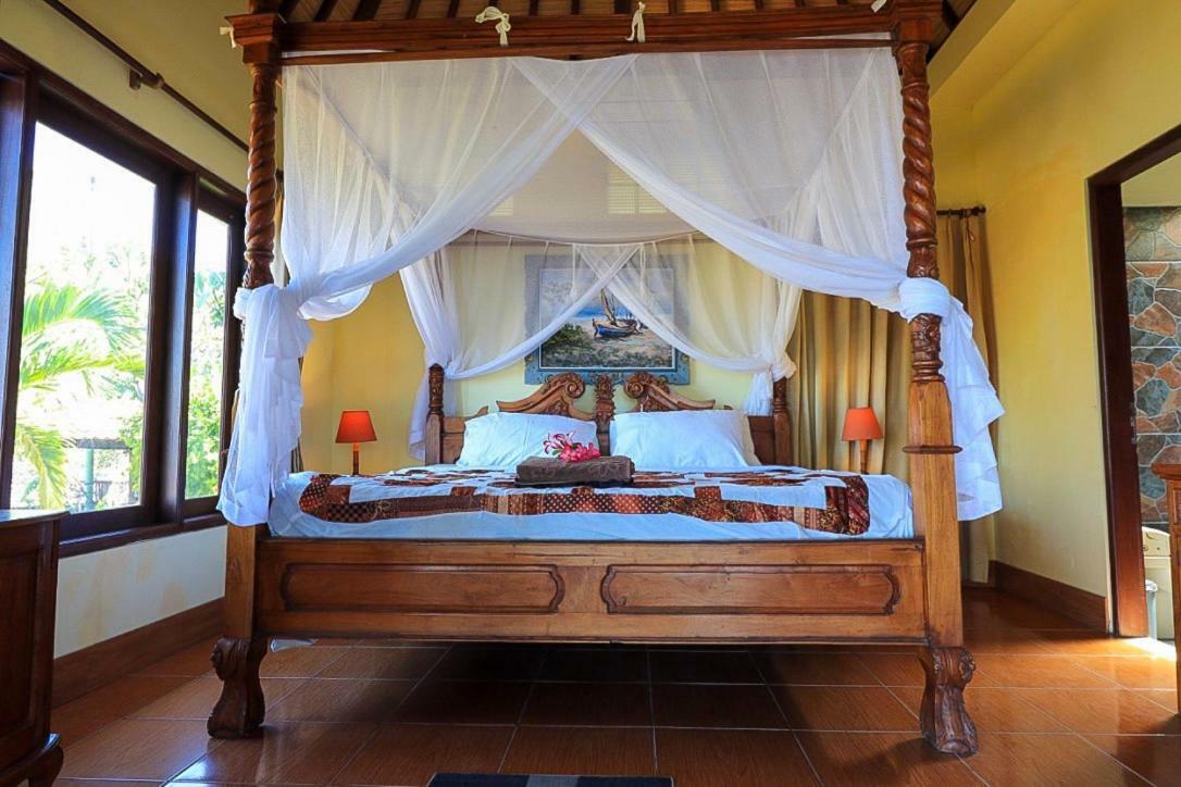 Eka Purnama Cottages Амед Экстерьер фото
